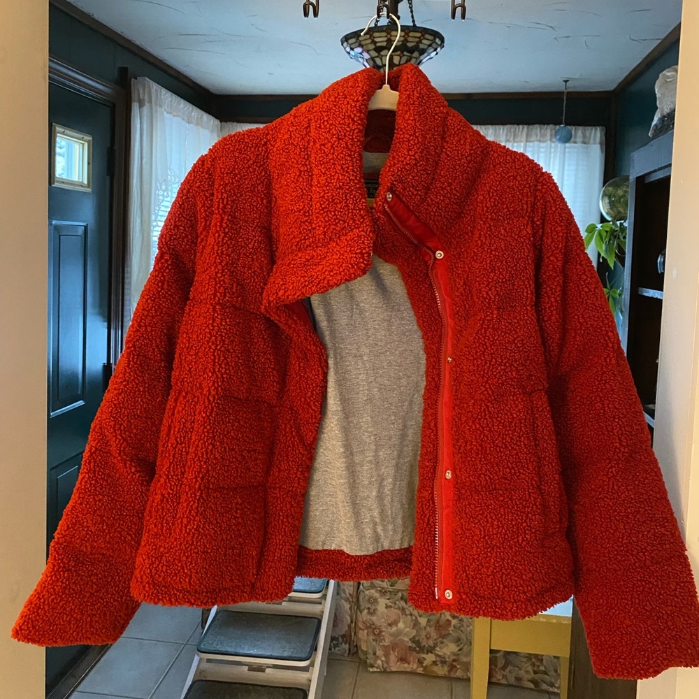 Abercrombie and Fitch. The color is a deep red. Coming in a size medium.